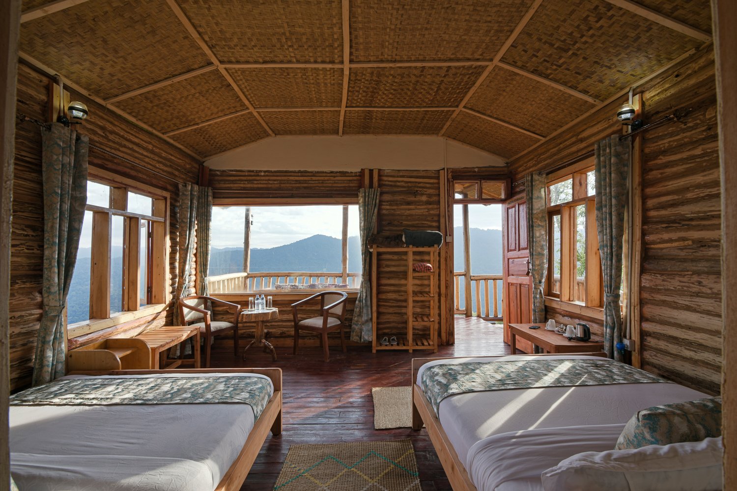Guest room and mountain view at Orugano Bwindi Lodge