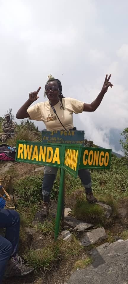 Border marker at the Uganda, Rwanda and DRC tripoint near Mount Sabyinyo
