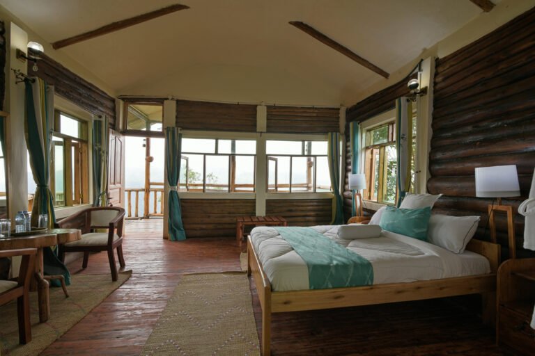 Guest room at Orugano Bwindi Lodge with forest views